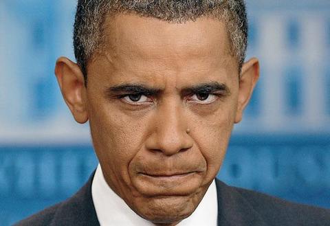 Барак Обама рискует войти в историю как «соавтор» технического дефолта. Произойдет это в том случае, если конгрессмены не одобрят повышение лимита заимствований правительства Фото: Jewel Samad (AFP)