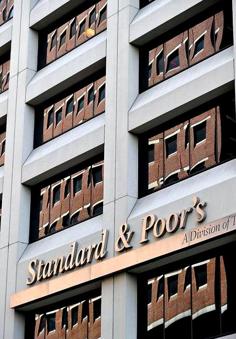 Standard & Poor‘s первым из «Большой тройки» агентств понизило суверенный рейтинг США Фото: Stan Honda (AFP)