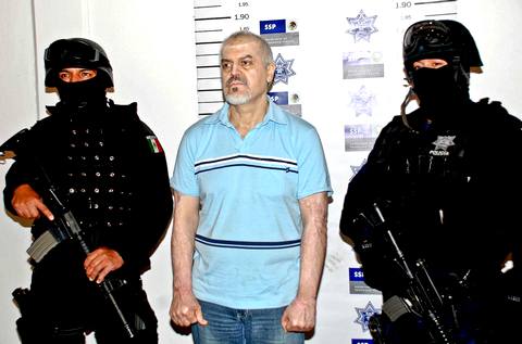 Один из лидеров Тихуанского наркокартеля Эдуардо Арельяно Феликс под стражей в Мехико. 26 октября 2008 года