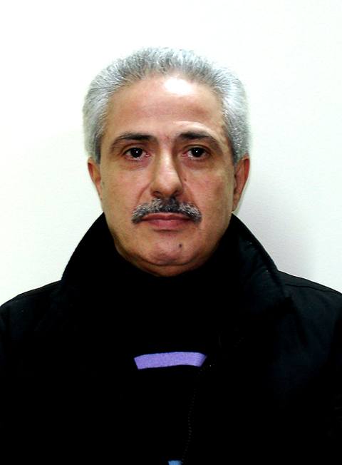 Один из главарей итальянской группировки «Ндрангета» Паскуале Конделло после ареста. 19 февраля 2008 года