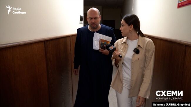 Суддя Сергій Вовк та журналістка Ольга Івлєва