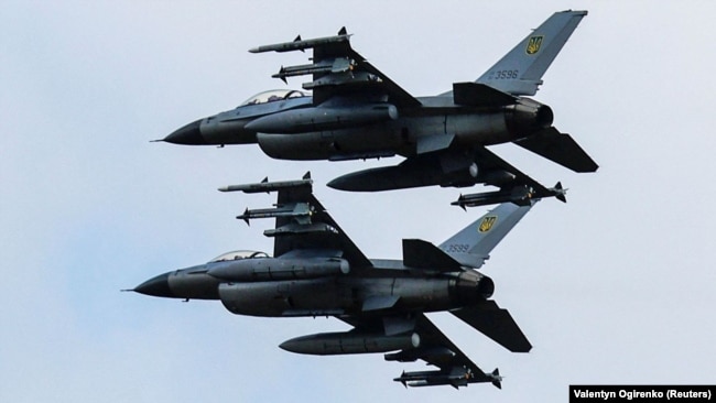 Винищувачі F-16 під час відзначення Дня Повітряних сил України. Київщина, 4 серпня 2024 року